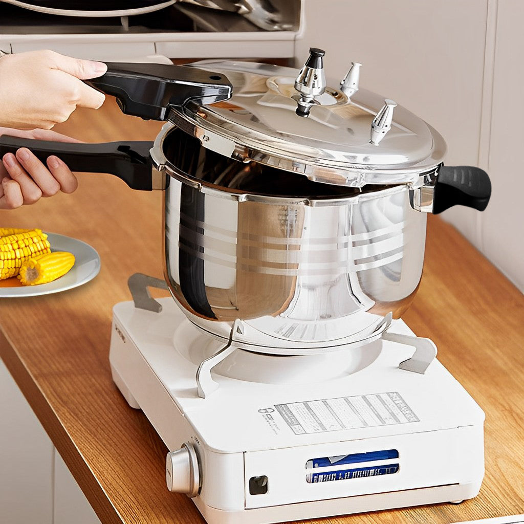 10L Commercial Grade Stainless Steel Pressure Cooker With Seal-image showing pressure cooker on a stove with a person opening the lid